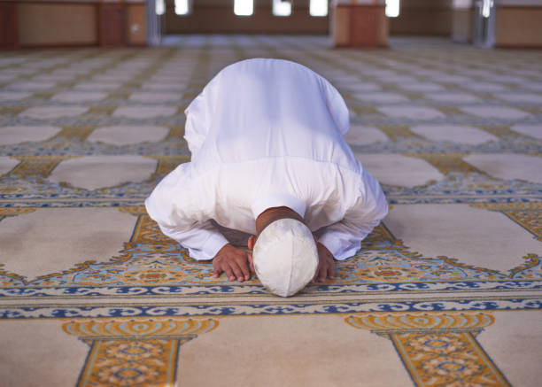 istock A frontal view of a young Muslim man prostrate during prayers at a mosque 1370888054