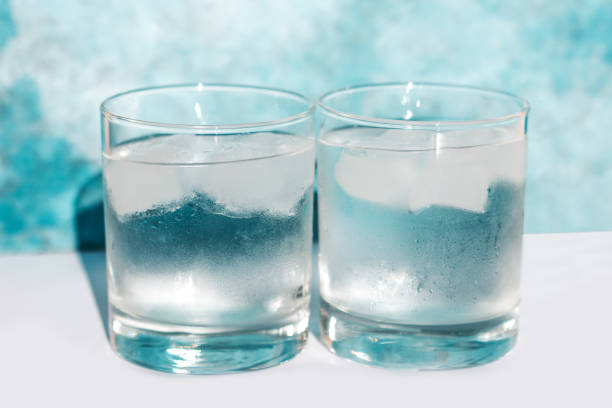 istock Ice water in glass glasses. Ice cubes 1370891095