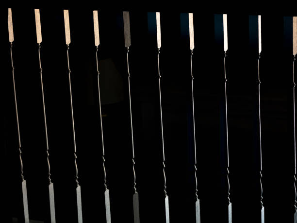 istock Sunlight reflection on an indoor wood railing 1370891842