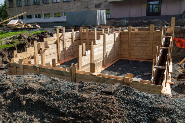 istock Wooden formwork prepared for pouring concrete stairs 1370895122