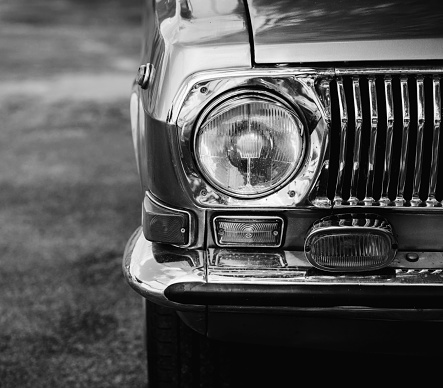 Classic car headlights. Vintage automobile