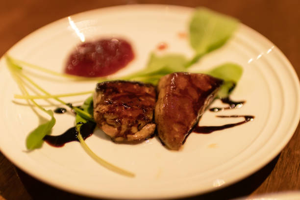 Grilled foie gras dressing with gray sauce, fine dining.