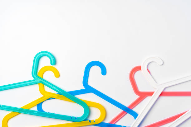 istock a pile clothes hangers on isolated white background 1370899225