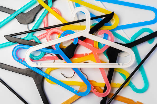 istock a pile clothes hangers on isolated white background 1370904117