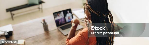 Female Designer Attending A Virtual Meeting Stock Photo - Download Image Now - Video Call, Working At Home, Video Conference
