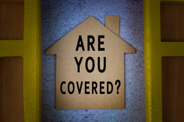 Are you covered text on house paper model with window frame background stock photo
