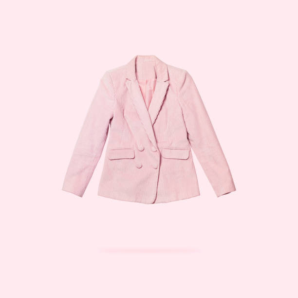 Womens fashionable flying pink blazer isolated on light pink background. Female fashion, stylish fabric jacket. Creative clothing concept. Spring clothes. Single piece of wardrobe, sale, discounts Womens fashionable flying pink blazer isolated on light pink background. Female fashion, stylish fabric jacket. Creative clothing concept. Spring clothes. Single piece of wardrobe, sale, discounts. corduroy jacket stock pictures, royalty-free photos & images