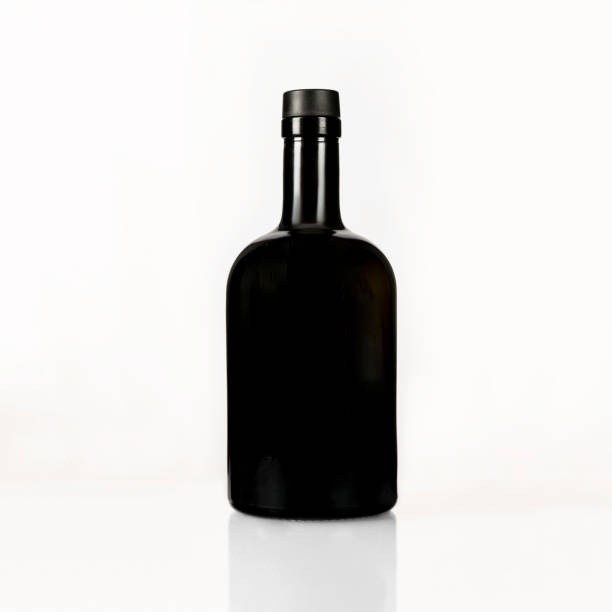 istock black olive oil bottle on white 1370909584