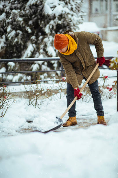 istock Cleaning snow in yard 1370910660