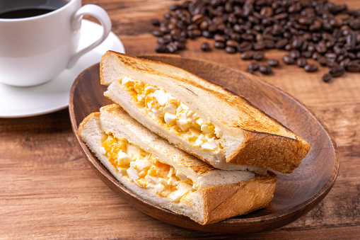 Hot egg sandwich and coffee