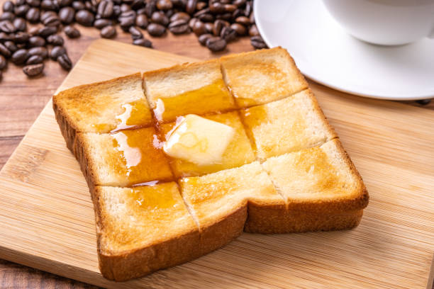 バターハニートースト - butter toast bread breakfast ストックフォトと画像