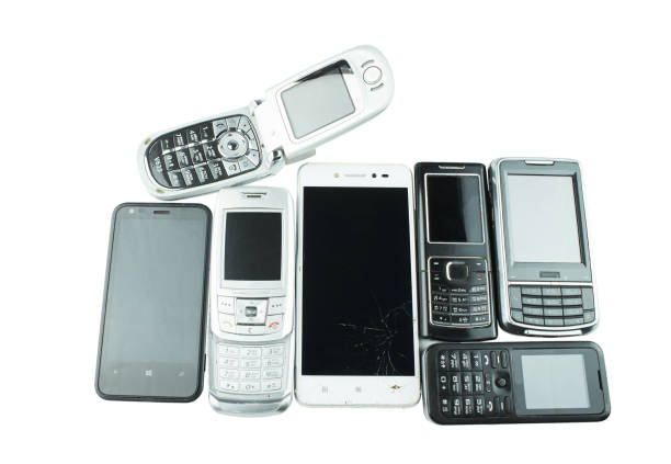 istock Old and obsolete cell phone isolated on white background. 1370913535