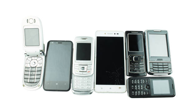 istock Old and obsolete cell phone isolated on white background. 1370913572
