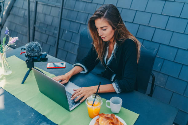 istock Influencer at home vlogging from the terrace 1370914348