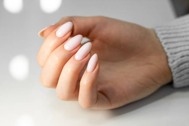 istock Beautiful nude manicure. 1370914637