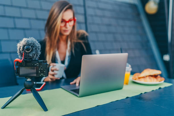 istock Influencer at home vlogging from the terrace 1370914661