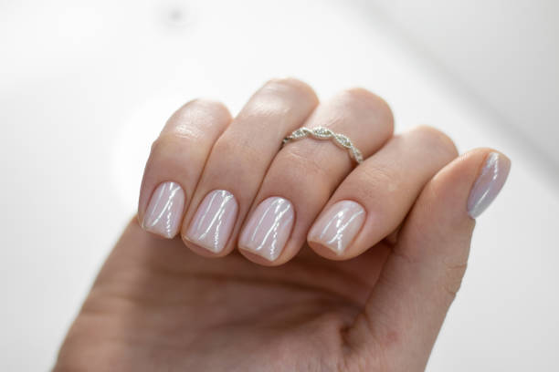 istock Beautiful nude manicure. 1370914668