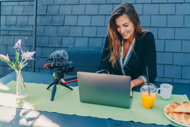 istock Influencer at home vlogging from the terrace 1370914728