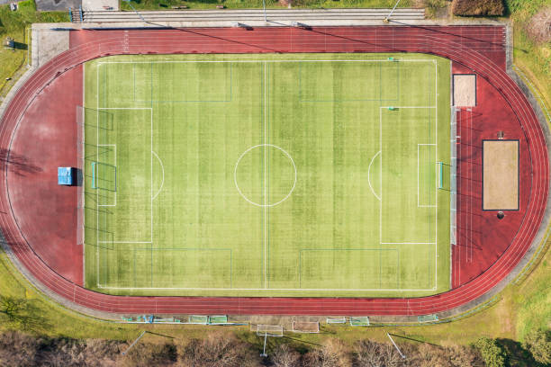 istock Top view of a soccer field 1370917213