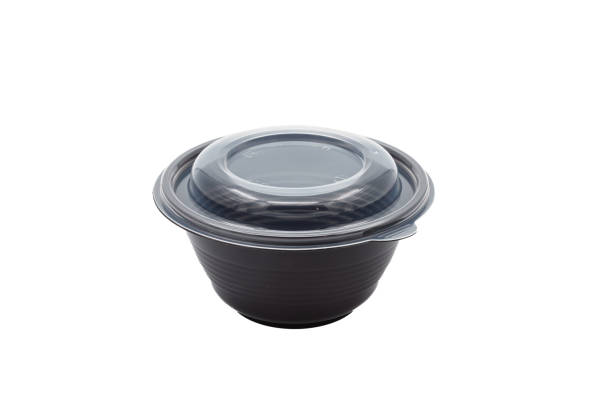 istock Plastic, black, round bowl for eating on a white background 1370917423