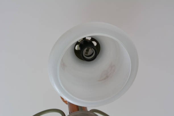 istock Chandelier shade. Broken ceiling chandelier without light bulb. 1370921280