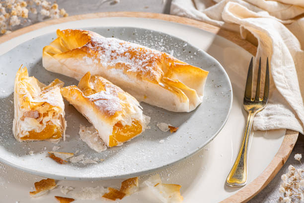 istock Typical portuguese sweets Pasteis de Vouzela served on countertop. Filo pastry with egg cream filling 1370924154