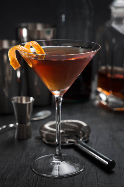 istock Manhattan cocktail with an orange twist as a garnish 1370925531