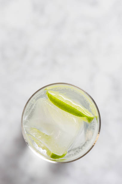 istock Top view of a gin tonic on a marble table 1370925733