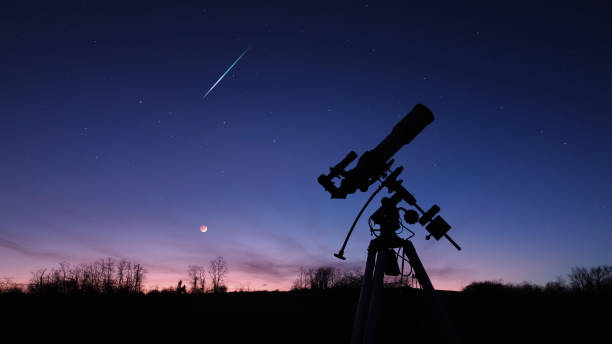 istock Silhouette of a telescope for observing space and astronomy objects. 1370925874