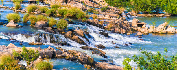 Peaceful natural scenery in Phan Rang, Vietnam. Rapids from a river flowing over rocks during the summer time. Travel and landscape concept.