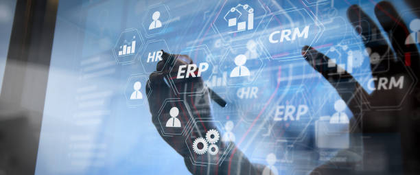istock Architecture of ERP (Enterprise Resource Planning) system with connections between business intelligence (BI), production, CRM modules and HR diagram.businessman hand using smart phone,mobile payments online. 1370928150