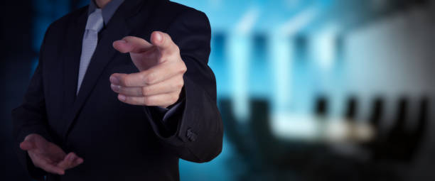 istock Businessman working with VR wide blank screen computer on server room in background. 1370928221