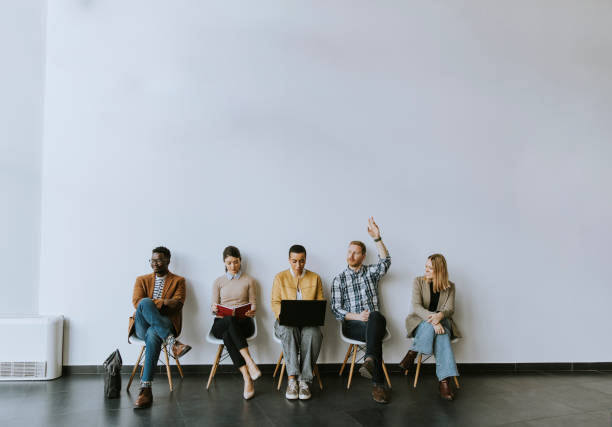 istock Group of bored people waiting for the job interview 1370929992