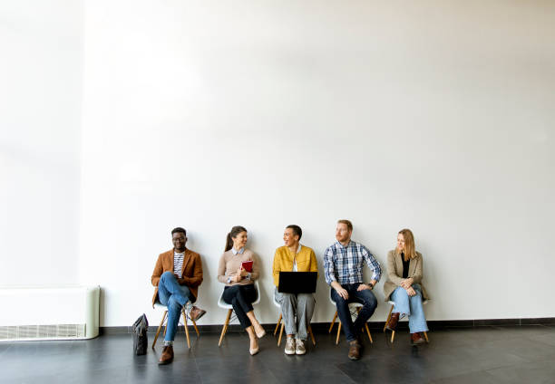 istock Group of bored people waiting for the job interview 1370930003