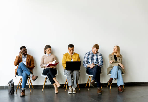 istock Group of bored people waiting for the job interview 1370930021