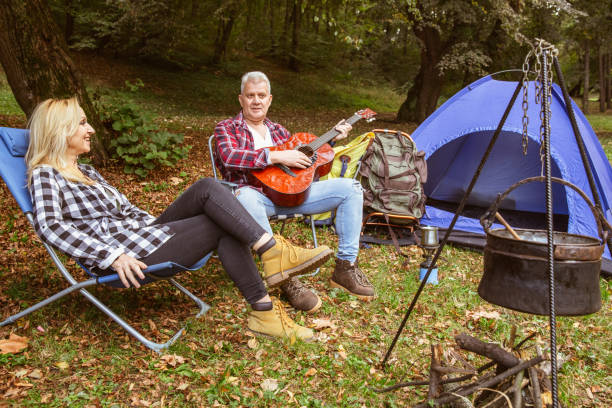 istock A middle-aged couple going for a camping outdoors 1370932696