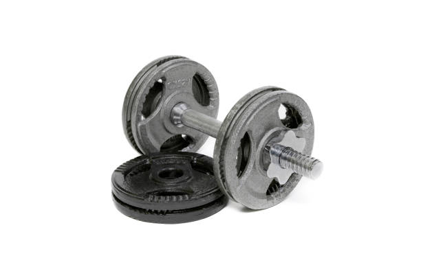istock Close up of a dumbbell isolated on white 1370938474