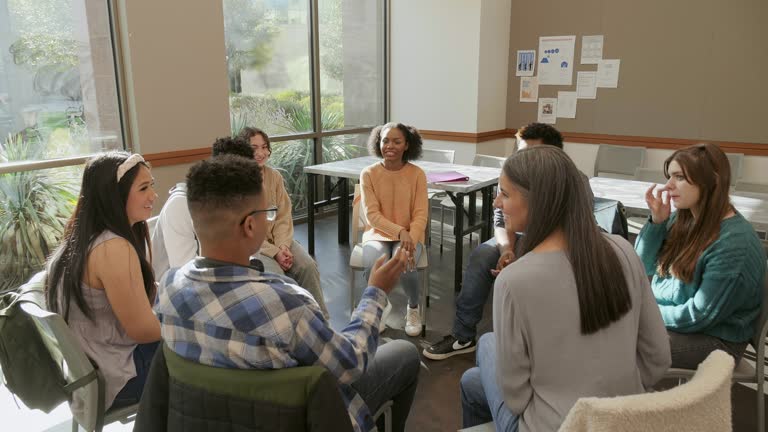 High school students participate in after school club meeting