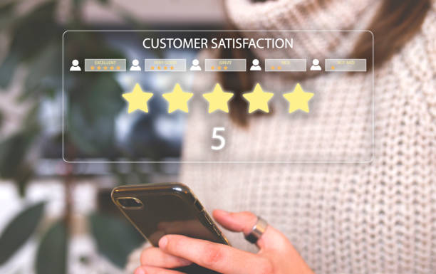 istock User give rating to service experience on online application. Customer review satisfaction feedback survey concept. Customer can evaluate quality of service leading to reputation ranking of business. 1370942797