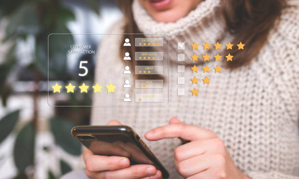 istock User give rating to service experience on online application. Customer review satisfaction feedback survey concept. Customer can evaluate quality of service leading to reputation ranking of business. 1370942841