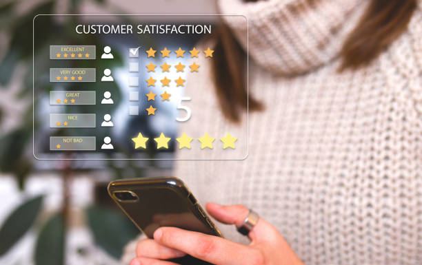User give rating to service experience on online application. Customer review satisfaction feedback survey concept. Customer can evaluate quality of service leading to reputation ranking of business.