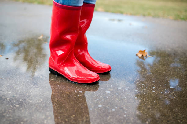 istock Woman in rain boots 1370948273