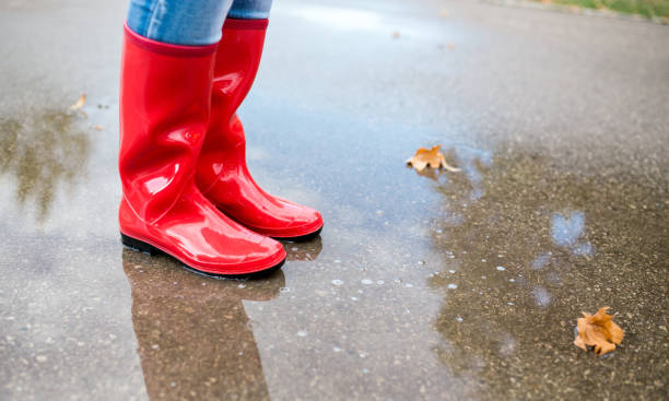 istock Woman in rain boots 1370948311