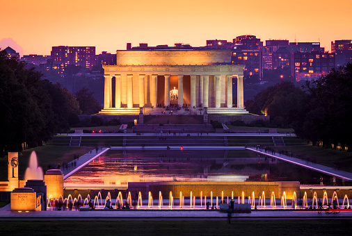 View of the iconic Washington DC by the Lincoln Memorial at night.