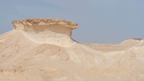 istock Mushroom shaped limestone rokcs in zekreet desert. 1370951117