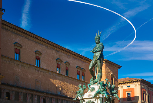 Neptune fountain in the Piazza Maggiore in Bologna, Italy in a sunny day
