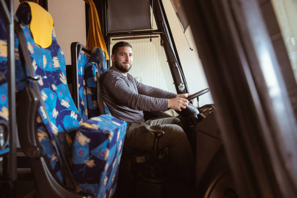 istock A driver posing for a photo in a bus 1370955635