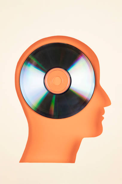 human head in paper cut style with cd - cd instructions message dvd imagens e fotografias de stock