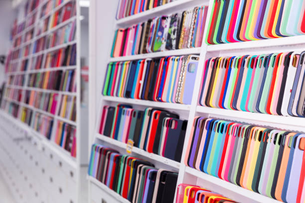istock Phone cases on shelves in store 1370957557