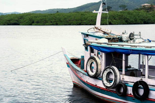 istock Fishing boat docked at the pier 1370957587
